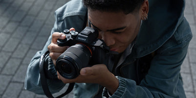 Man using Sony A7 V Mirrorless Camera