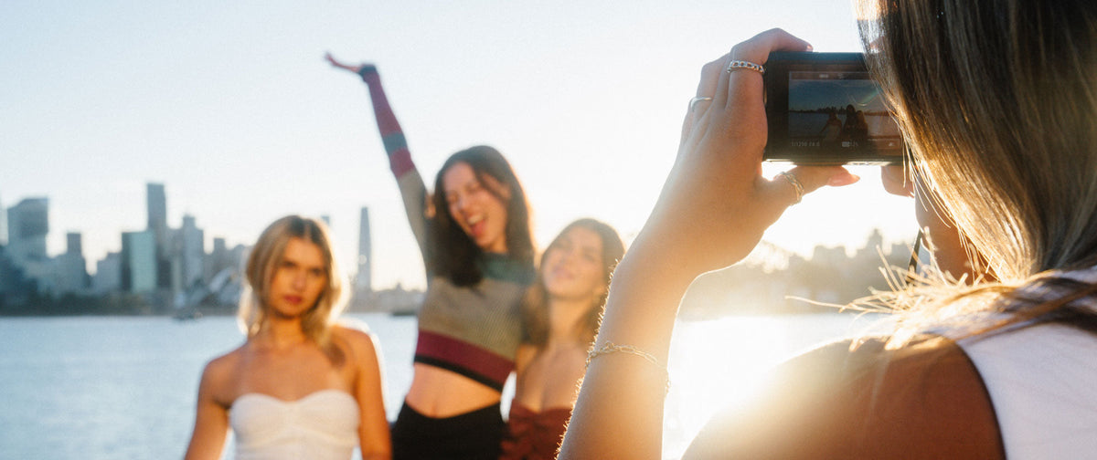 Girls taking photo with Point and Shoot