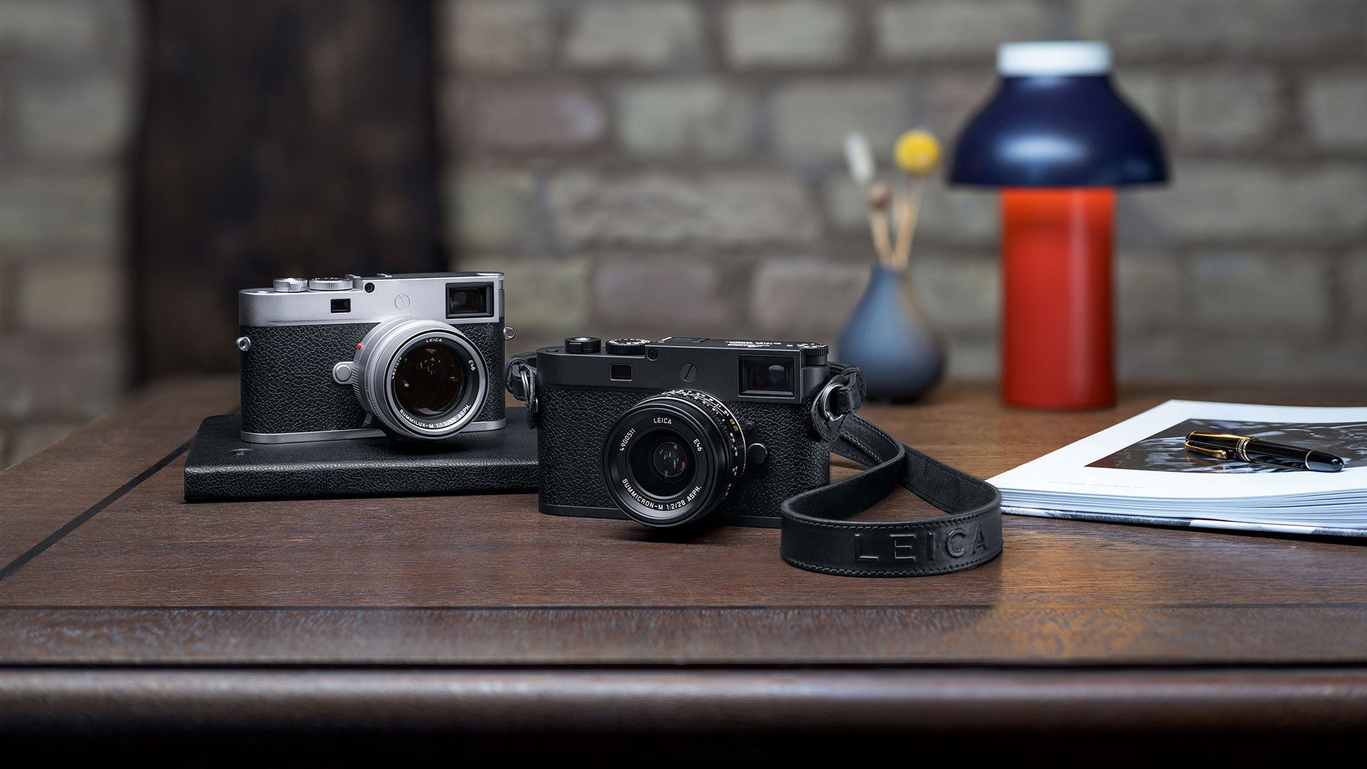 Two Leica M11P's on a desk