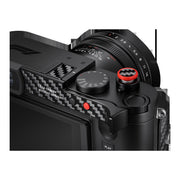 Close-up of the carbon-fibre thumb rest and red soft-release button on the Leica Q3 43 Formula 1 Edition