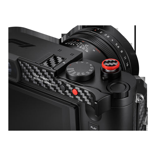 Close-up of the carbon-fibre thumb rest and red soft-release button on the Leica Q3 43 Formula 1 Edition