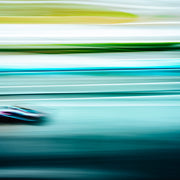 Formula 1 car at speed, photographed with the exclusive Formula 1 Leica Look