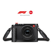 Leica Q3 43 Formula 1 Edition with carrying strap, front view, official F1 and Leica partnership logo