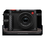Leica Q3 43 Formula 1 Edition on the Drop XL wireless charging pad with the carbon-fibre charging hand grip