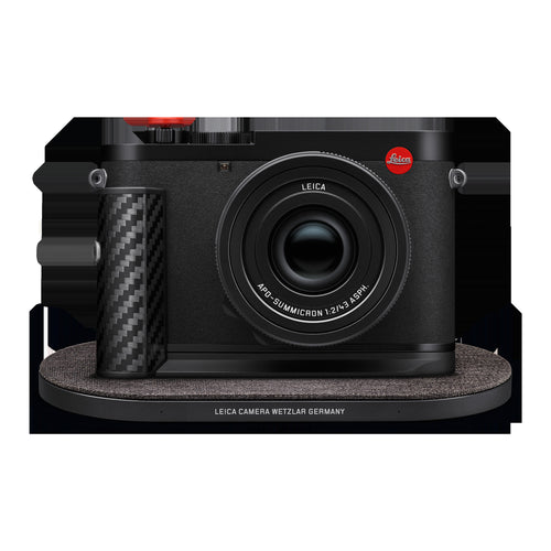 Leica Q3 43 Formula 1 Edition on the Drop XL wireless charging pad with the carbon-fibre charging hand grip